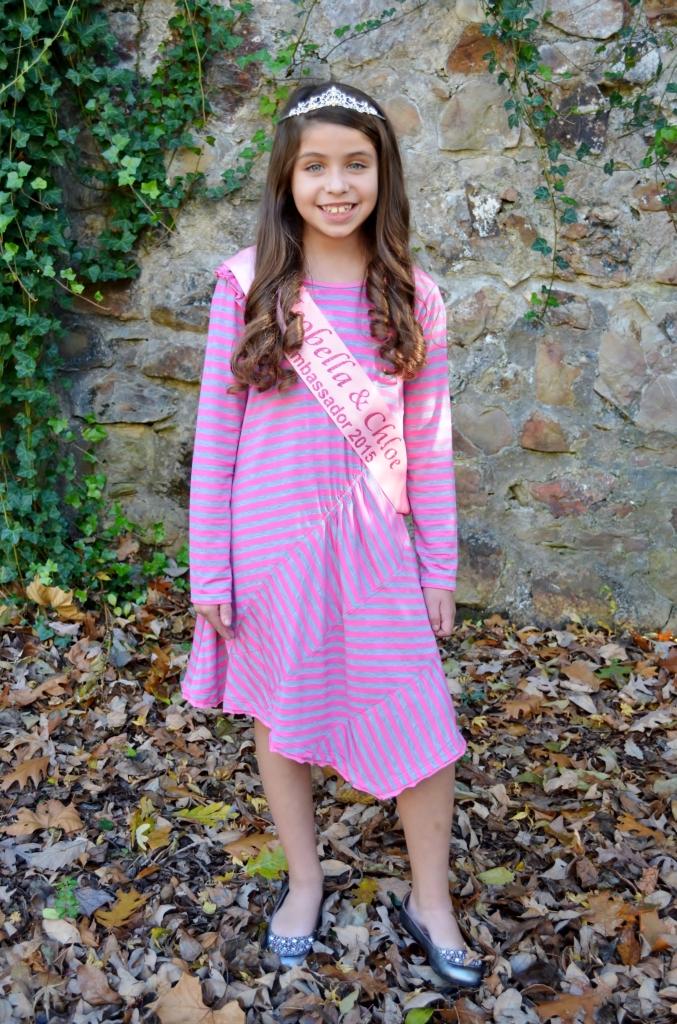 Madison is wearing the Pink-A-Boo dress, style 8303PK, available in size 4-10.