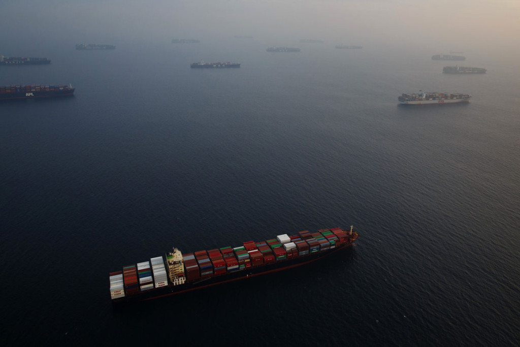 Ships waiting to be unloaded at the Port of Los Angeles on Feb. 18, 2015. Photographer: Patrick T. Fallon/Bloomberg