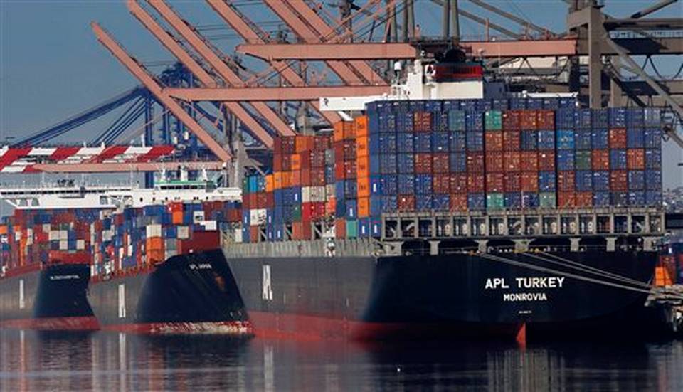 Container ships waiting to be unloaded at the Port of Los Angeles. Photo courtesy of www.sacbee.com